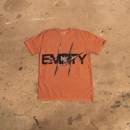 orange barbed tee