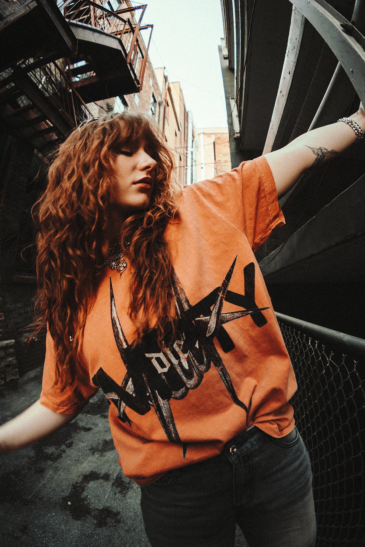 orange barbed tee